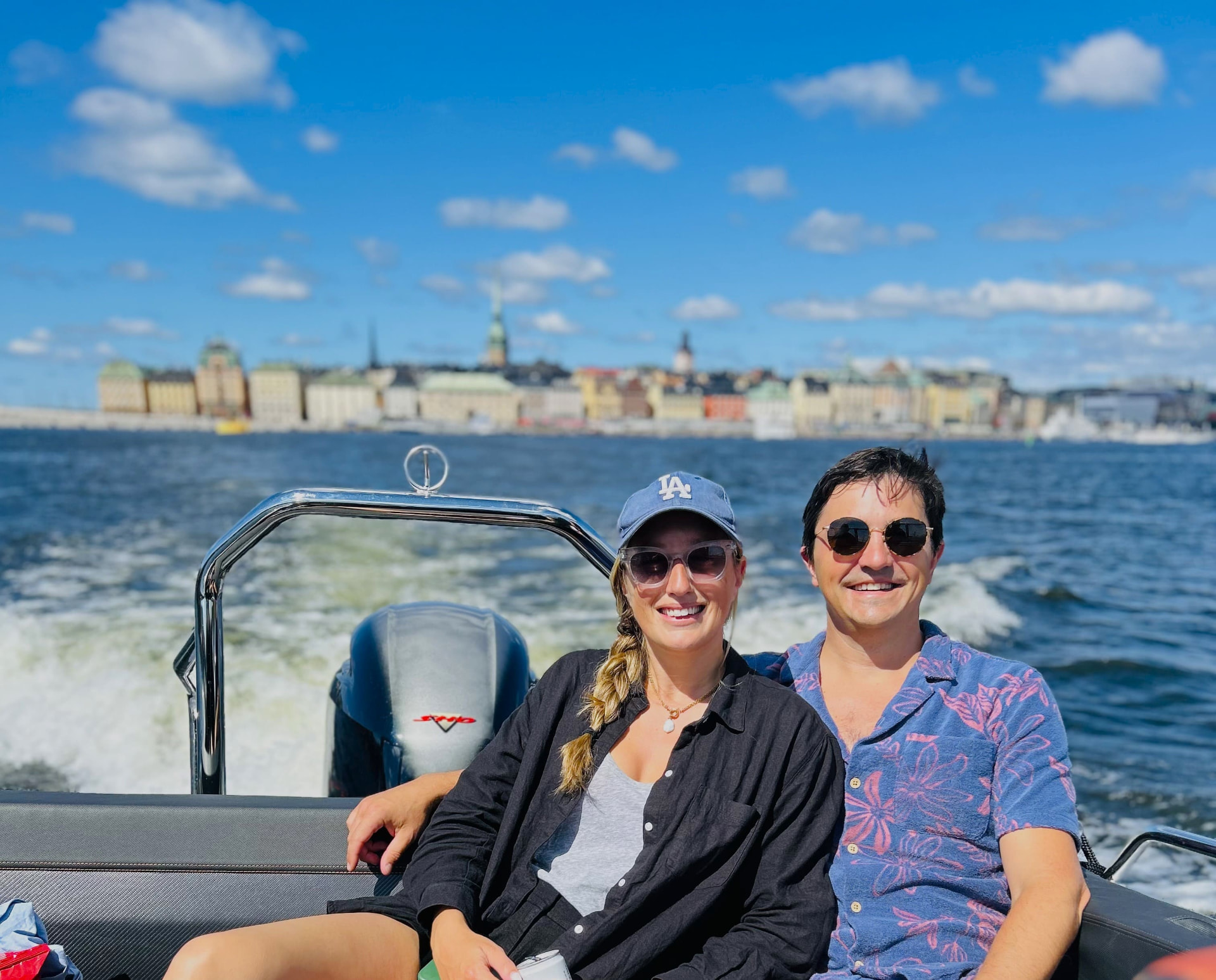Private motorboat cruising through the Stockholm Archipelago on a calm summer day